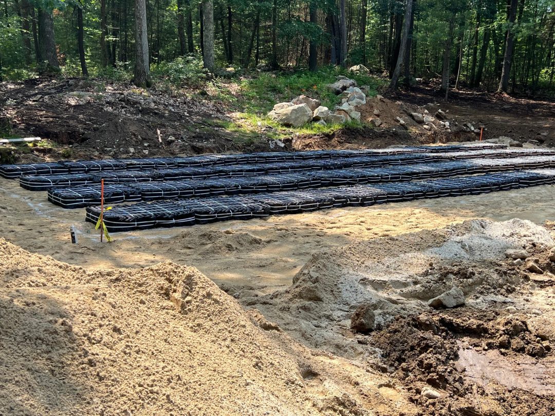 Professional residential drainage system installation in Concord, MA. We design and install effective drainage solutions to manage stormwater, protect properties, and prevent flooding in residential neighborhoods.